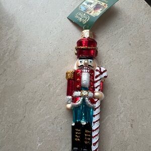 Festive Red and Gold Nutcracker Figurine